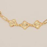 Floral Charm Bracelet 0.56 Grams, 18KT Gold